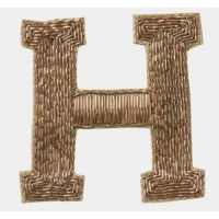 Broche H-*